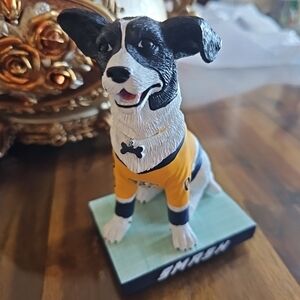 Black and White Dog Figurine with Yellow Sweater